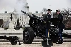 The Presidential Salute Battery fires a 21 gun salute on December 5, 2018