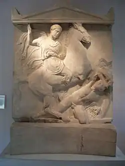 Marble sculpture, rectangular with a triangular top: Dexileos is depicted on horseback, spearing a nude enemy.