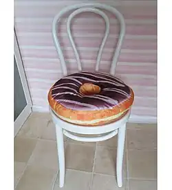 Donut cushion from an interior design department. Design of an edible donut.