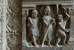 One of the few Gandharan depictions of the monkey offering honey. His gift accepted, the monkey dances excitedly.