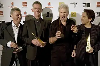 Dragon at the ARIA Hall of Fame Melbourne Town Hall, 1 July 2008 L–R: Kerry Jacobson, Rob Taylor, Todd Hunter, Alan Mansfield Ivan Thompson, keyboard player