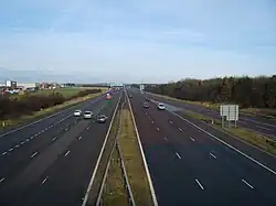 Tyne and Wear, England above the A1(M) motorway of vehicles driving on the left heading north and driving on the right heading south.