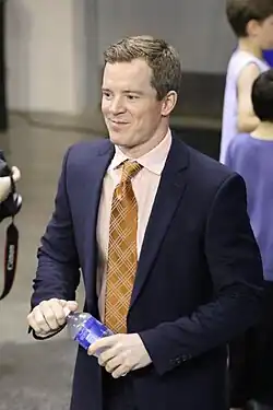 Dusty May as an assistant at Florida before a 2015 game