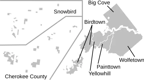 A labeled map of the communities of the EBCI. In the top left of this image is the community of Snowbird, which consists of scattered plots of land in Graham County, North Carolina. In the bottom left is the community of Cherokee County, which consists of scattered plots of land in Cherokee County, North Carolina. To the left is the mostly contiguous main area of the Qualla Boundary, consisting of Birdtown to the west and south, Yellowhill and Painttown in the center, Wolfetown to the southeast, and Big Cove to the northeast.