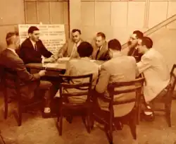 Charles Cruse, Dr. Ben Ami Blau, Dr. Leon Katchmar, John Stephens, Robert Jelinek, Dr. John Weisz, Dr. Edward Weiss, and Lois Ivey meet at HEL.
