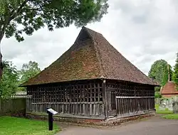 Bellcage to north side of churchyard