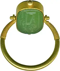 Moveable ring from 664 to 322 BC. Green jasper and gold. The Walters Art Museum.