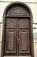 Elaborately carved wooden door