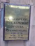Plaque outside the embassy depicting the Coat of arms of Cuba