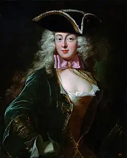 Painting of a smiling woman in masculine clothing