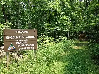 A photo of a welcome sign along the trail in Engelmann Woods Natural Area