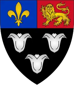 Arms of Eton College: Sable, three lily-flowers argent on a chief per pale azure and gules in the dexter a fleur-de-lys in the sinister a Lion passant guardant.