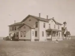 Photograph of exterior of St. Elizabeth's Mission School circa 1900, near Wakpala, South Dakota on Standing Rock Reservation