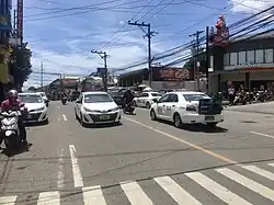 A Jollibee store along F. Llamas Street