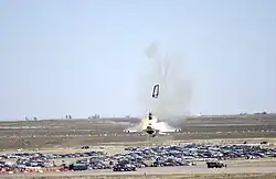 Image 8At the Mountain Home Air Force Base in Elmore County, Southwestern Idaho in September 2003 Capt. Christopher Stricklin ejected from the USAF Thunderbirds number six aircraft less than a second before it impacted the ground at an air show at the base. Stricklin, who was not injured, ejected after guiding the jet away from the crowd of more than 60,000 people