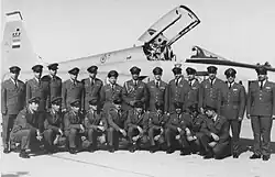 IIAF officers infront of a F-5E.