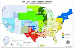 A map of the United States divided into numerous (56) districts, differentiated by colors, which are grouped by shades indicating the Farm Credit Bank or Agricultural Credit Bank district to which it belongs.