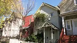 In 2004, NHSRC's two-story Factor 10 house (red house pictured) at 1919 N. Keeler in the Hermosa neighborhood was named one of the top 10 Green Projects by the American Institute of Architects.