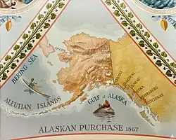 A painting showing Alaska and it's mountains. Alaska is centerd in the image, and text reading "ALASKAN PURCHASE 1867" rests under the painting.
