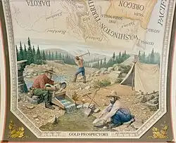 This mural shows different methods used by prospectors in the search for wealth in California, the Yukon and Alaska.