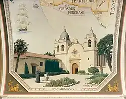 A converted Native American kneels in prayer under the guidance of a monk in front of the El Carmelo mission.