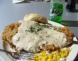 Chicken fried steak topped with gravy