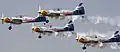 Zlín Z-50s of The Flying Bulls aerobatics team at Aero India 2013