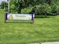 The entrance sign of the Hampshire Forest Preserve.