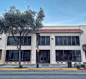 Two-story building with the following on the facade: "Job Printing", "Fresno Republican", "Book Binding"