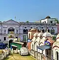 Front Facade of the Mallick Bari Palace, with four of the twelve Shaivite shrines visible
