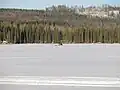 Frozen Gregg Lake with all-terrain vehicle