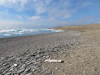 Fury Beach - still littered with wooden & metal material.