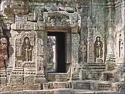 Gate of the gallery surrounded by two guards