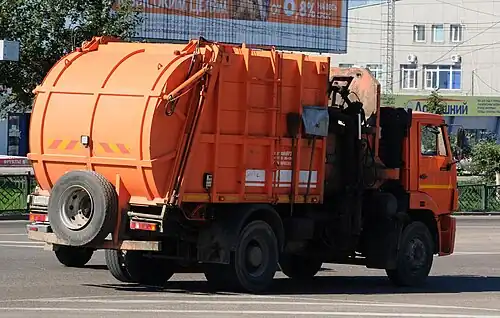 Garbage truck KAMAZ on the streets of Ulan-Ude