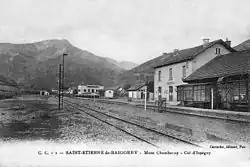 Black-and-white postcard of a mountain railway station.