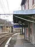 Gare de Fort l'Ecluse Collonges. The clock works, although it's on summer time in winter. In the left background, the Divonne line climbs away steeply