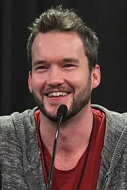A cropped portrait of Gareth David-Lloyd, Solas' voice actor