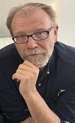 George Saunders award-winning American writer of short stories, essays, novellas, children's books, and novels. Professor at Syracuse University.