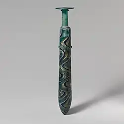 Late Hellenistic glass gold-band mosaic alabastron (perfume bottle); 1st century BC; glass and gold leaf; Metropolitan Museum of Art