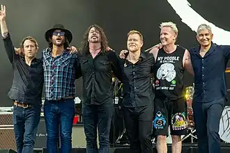 Foo Fighters at Glastonbury Festival 2023. From left to right: Chris Shiflett, Rami Jaffee, Dave Grohl, Nate Mendel, Josh Freese and Pat Smear.