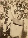 Boy posing as Bacchus