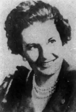 Black and white photo of Lee smiling