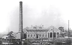The depot complex c. 1910. The Glossop Brook iron bridge appears in the foreground.