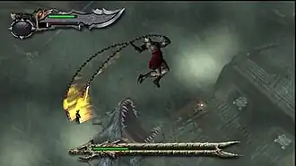 Character Kratos attacks a sea-monster while falling in the air.