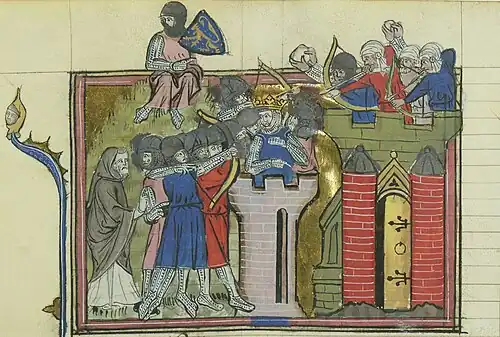 A miniature depicting a walled town with arrow men on the walls, and a siege tower and dozens of soldiers attacking the town