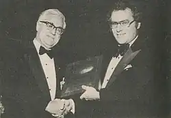 Gordon F. Henderson (left) presents Hardy the Harold Moon award (from RPM magazine)