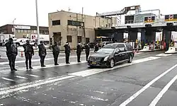 Officers of the Metropolitan Transportation Authority and a state police honor guard saluting Cuomo's hearse as it passes through the Queens–Midtown Tunnel, January 6, 2015
