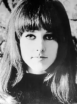 Close up photo portrait of Grace Slick with bangs, taken in 1967.