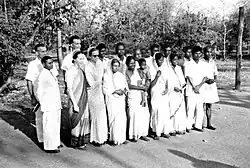 Class of 12 who received diplomas. O. P. Lal, teachers: John and Miriam Beachy, Paul and Esther Kniss (1959).