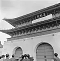 Unveiling of the reconstructed Gwanghwamun, with Hangul calligraphy by Park Chung Hee[160] (1968)